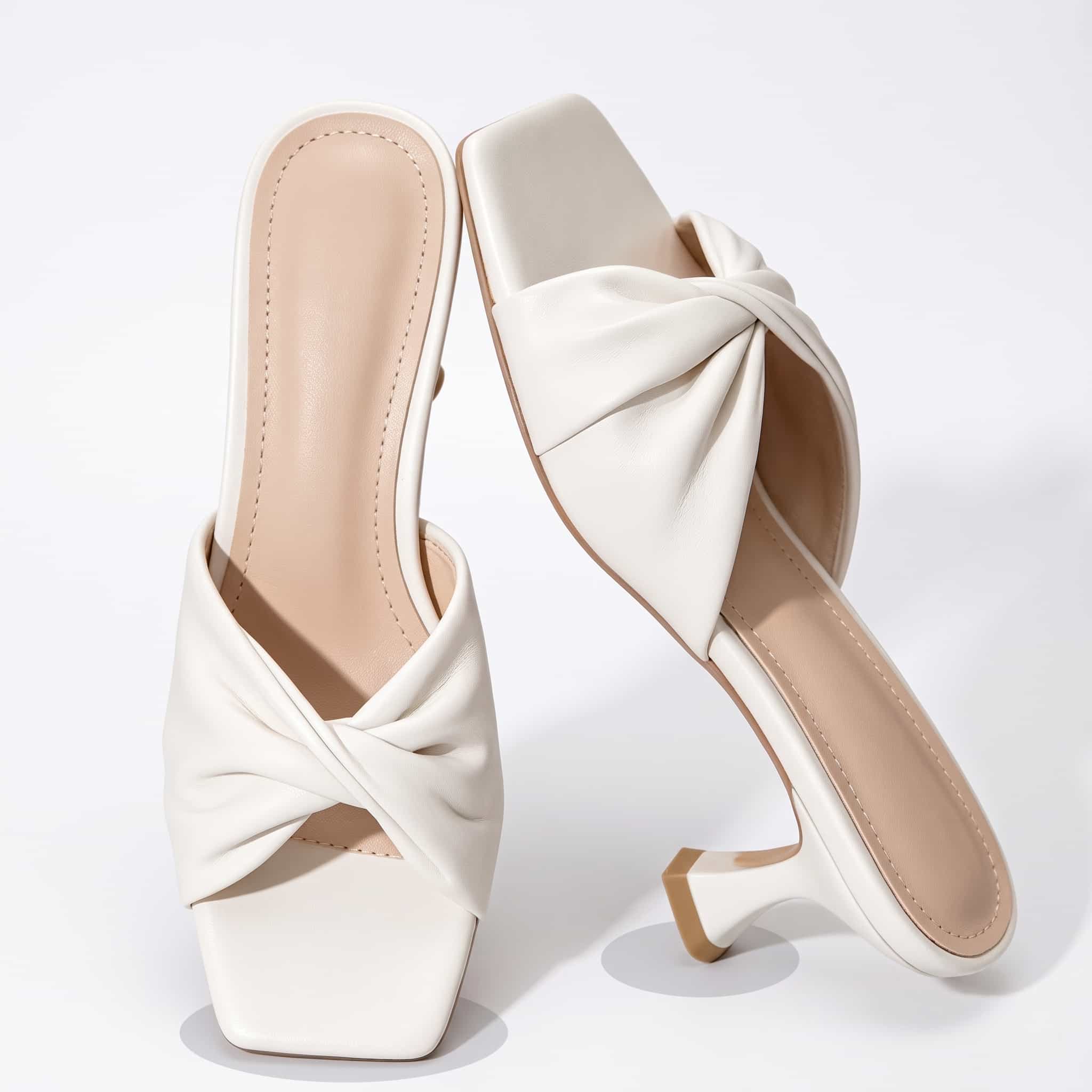 Mules à petits talons blanches